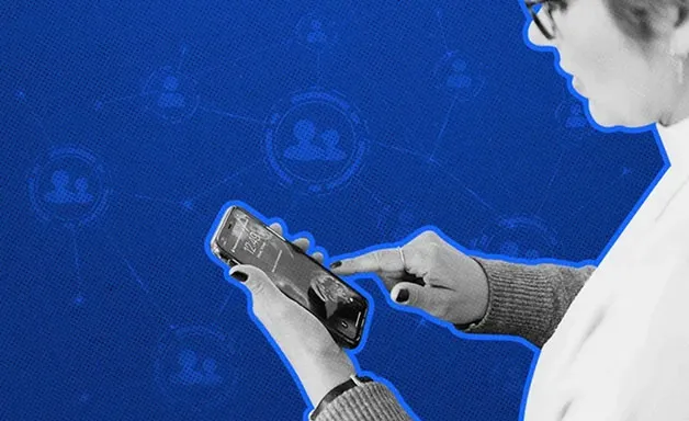Person interacting with a smartphone with social network icons in the blue background.